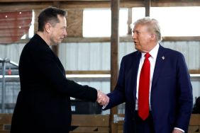 Elon Musk (L) shakes hands with Republican presidential nominee, former President Donald Trump back stage during a campaign rally at the Butler Farm Show grounds on October 05, 2024 in Butler, Pennsylvania. This is the first time that Trump has returned to Butler since he was injured during an attempted assassination on July 13.