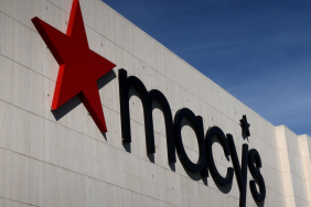 A Macy's corporate logo hangs on the wall of their store at the Garden State Plaza Mall on October 26, 2024, in Paramus, New Jersey.