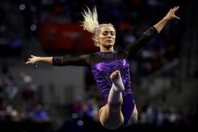 Olivia Dunne of the LSU Tigers competes during a meet against the Florida Gators at the Stephen C. O'Connell Center on February 23, 2024 in Gainesville, Florida.