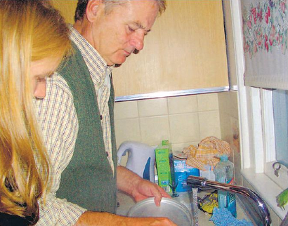 Doing the dishes for Norwegian students.